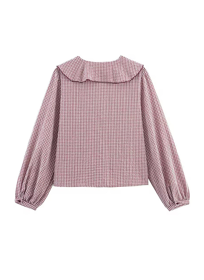 SARA - Blusa a cuadros con volantes