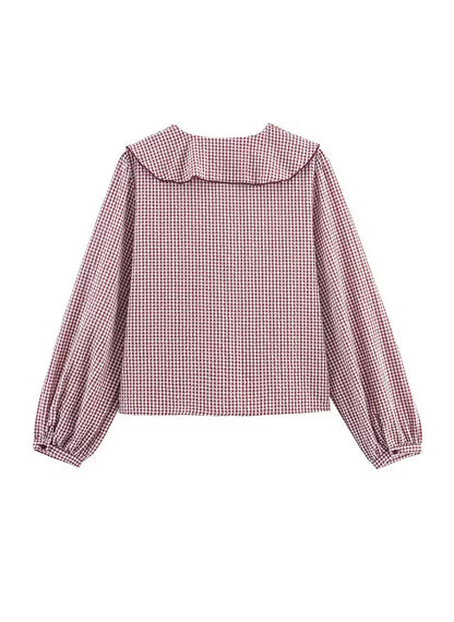 SARA - Blusa a cuadros con volantes