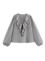SARA - Blusa a cuadros con volantes