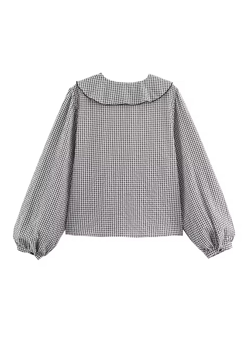 SARA - Blusa a cuadros con volantes